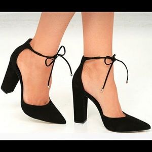 Black Steve Madden chunky tie up heel.